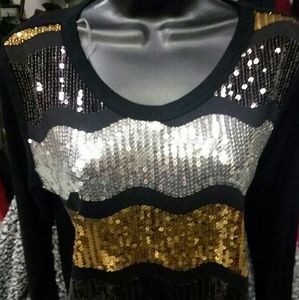 Super cute and classy top with lots of bling
